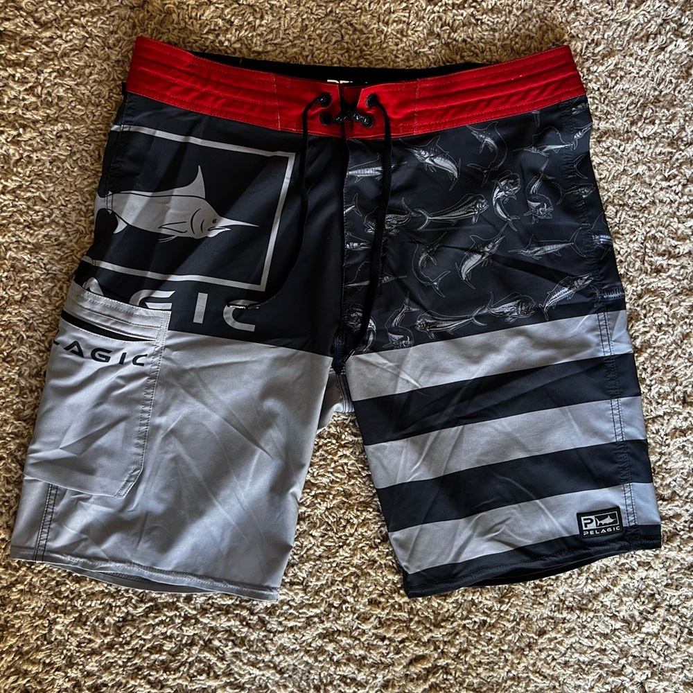 Pelagic Red, Black, and Gray Swim Board Shorts